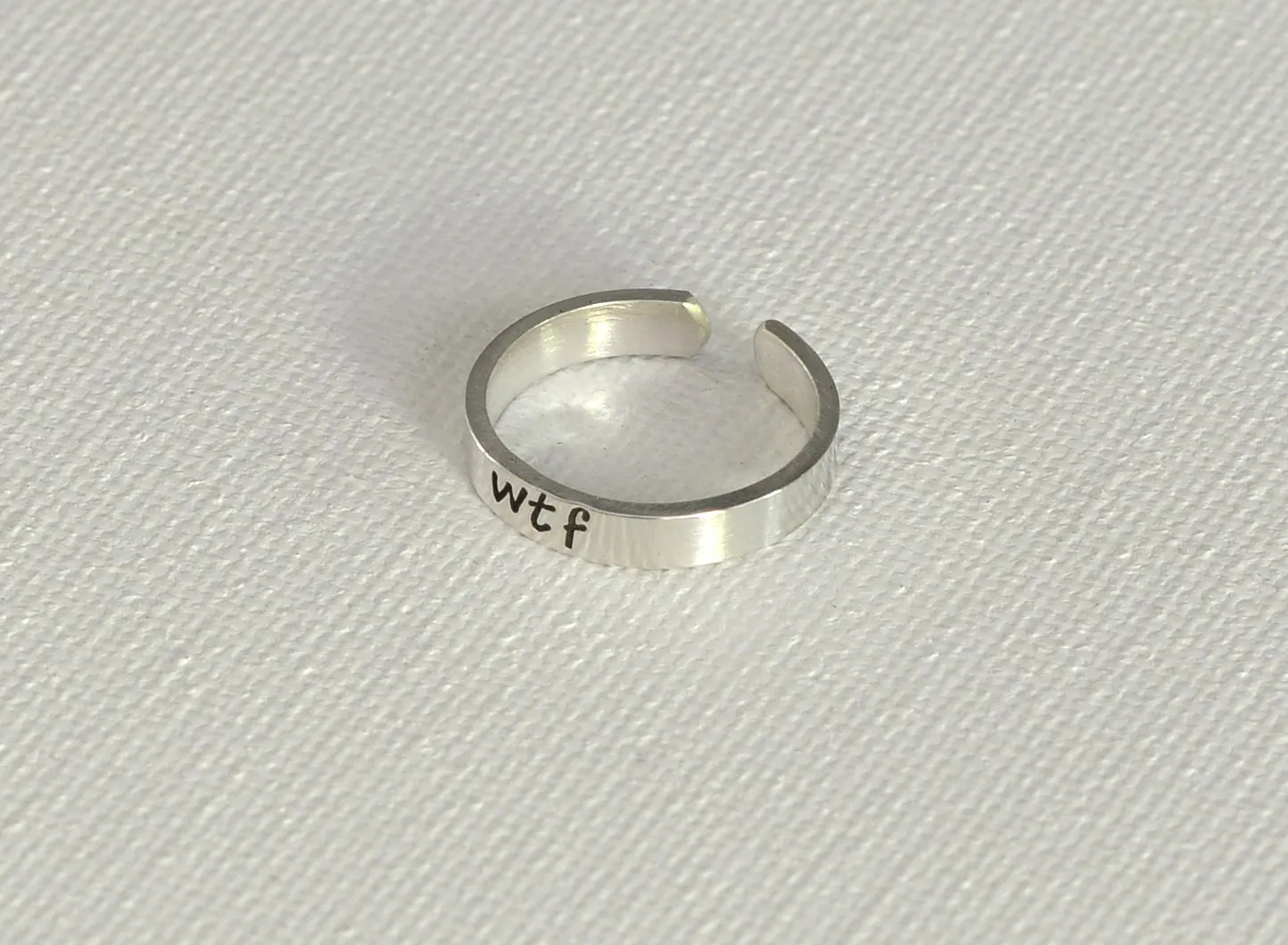 WTF sterling silver toe ring